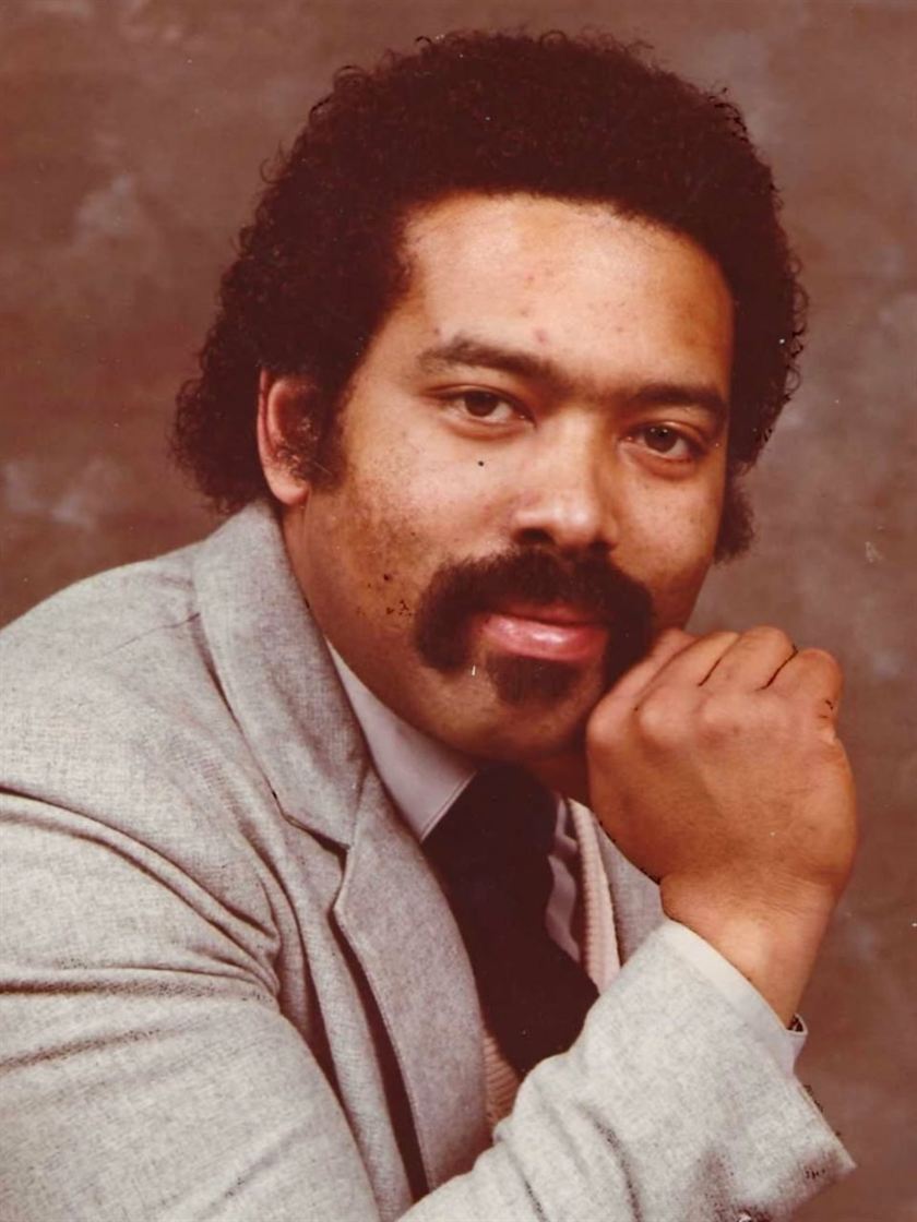 Before: a faded, reddish studio portrait of a man