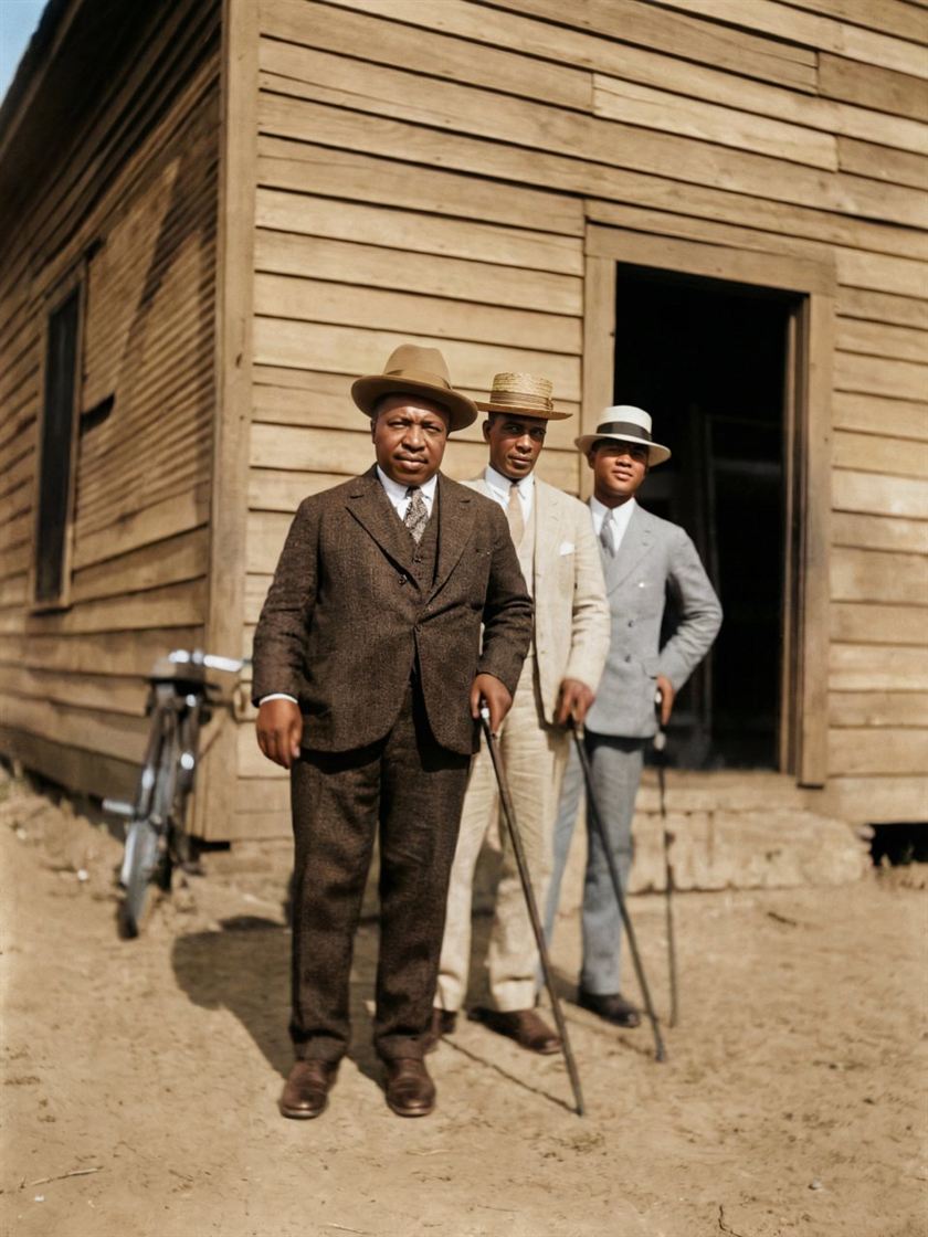 After: the same three men, restored in full color